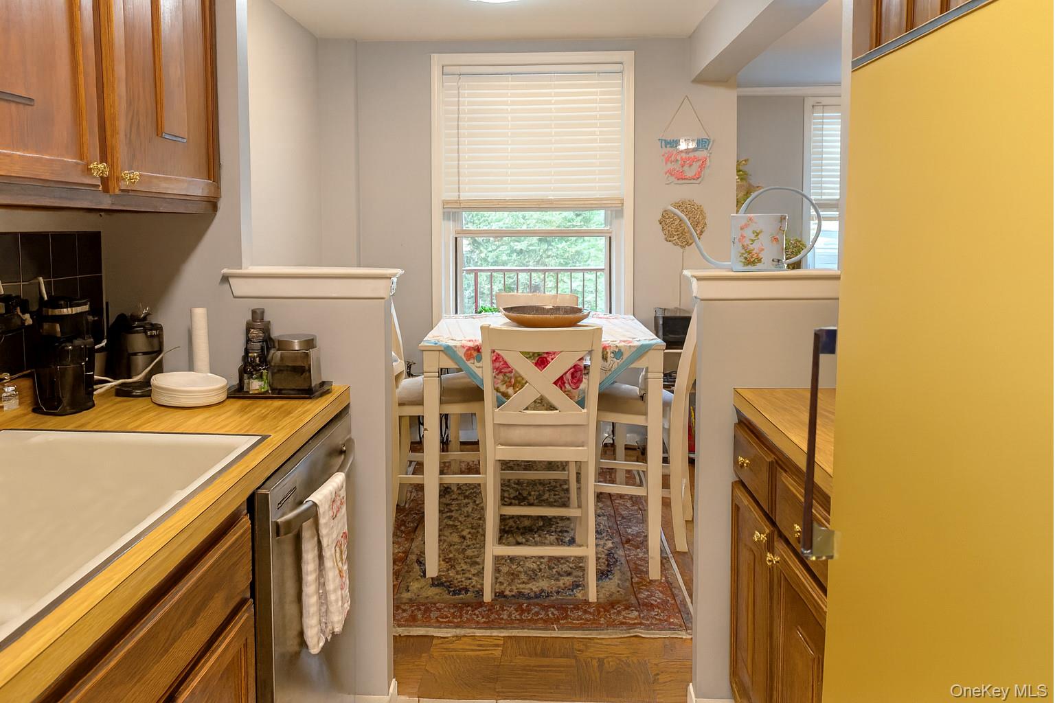 315 West 232nd Street, Unit 2M Bronx, NY 10463 - Photo 4 of 13 a view of a kitchen with a window