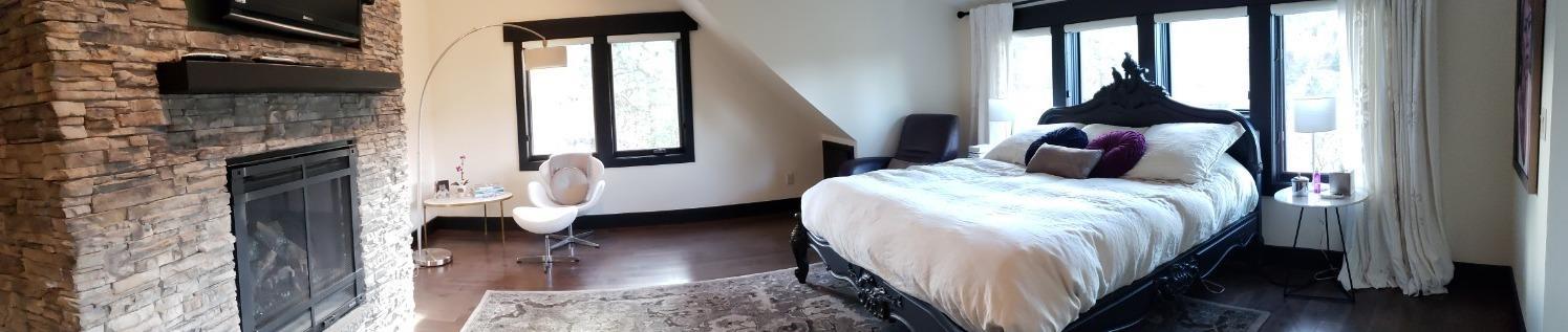 135 Lilly Road Jacksonville, OR 97530 - Photo 23 of 34 Beautiful fireplace in Master Bedroom