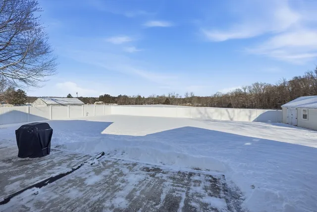 a view of lake with mountain in the background