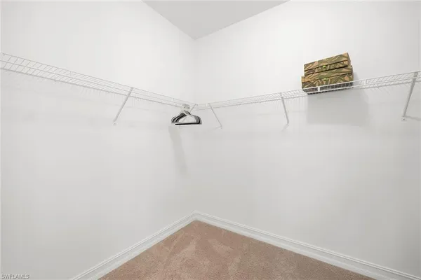 a view of small space with racks on the wall