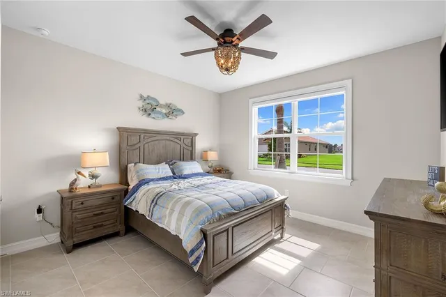 a bed room with a bed and a window