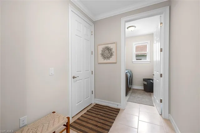 a view of room with window and bathroom