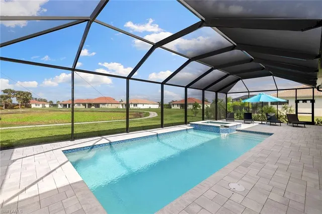 a view of a swimming pool with a porch