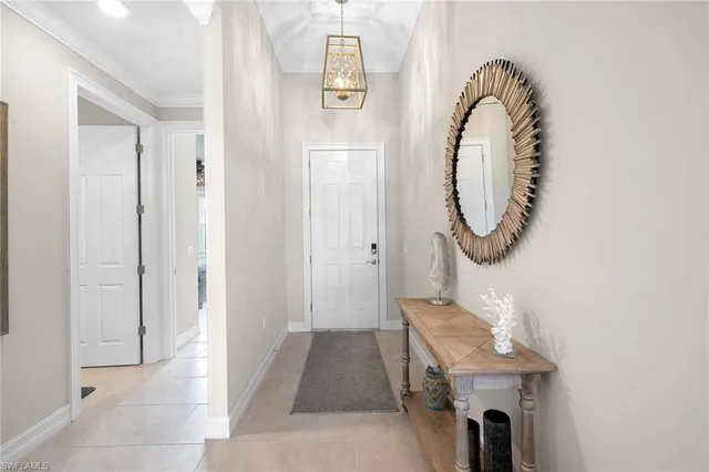 a view of a hallway with washer and dryer