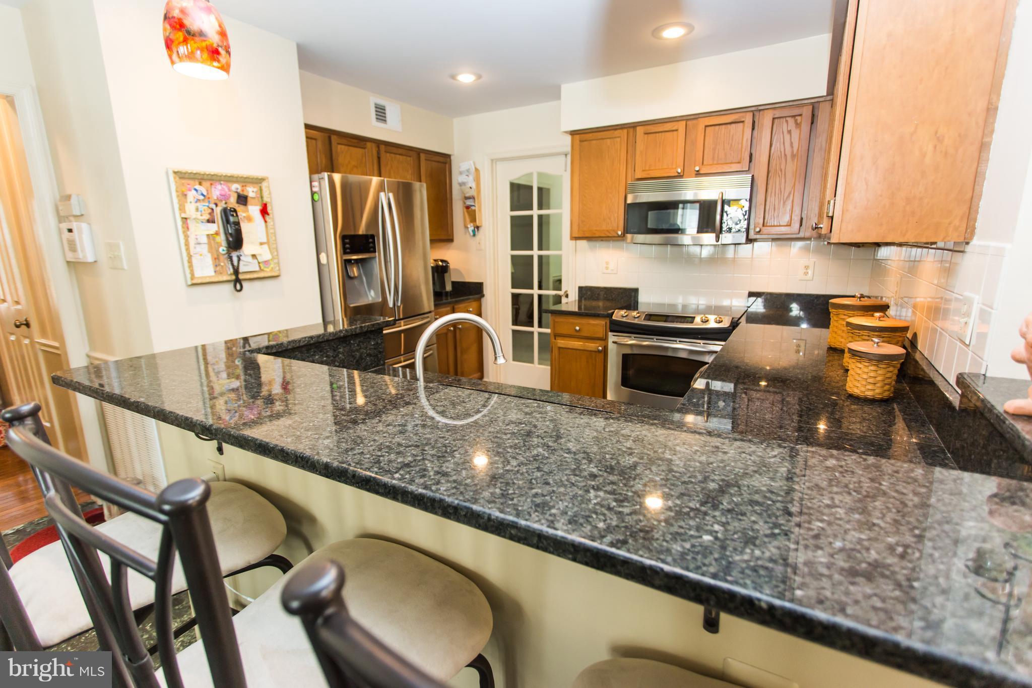 6604 Morning Ride Circle Alexandria, VA 22315 - Photo 2 of 30 Updated kitchen with granite counter tops