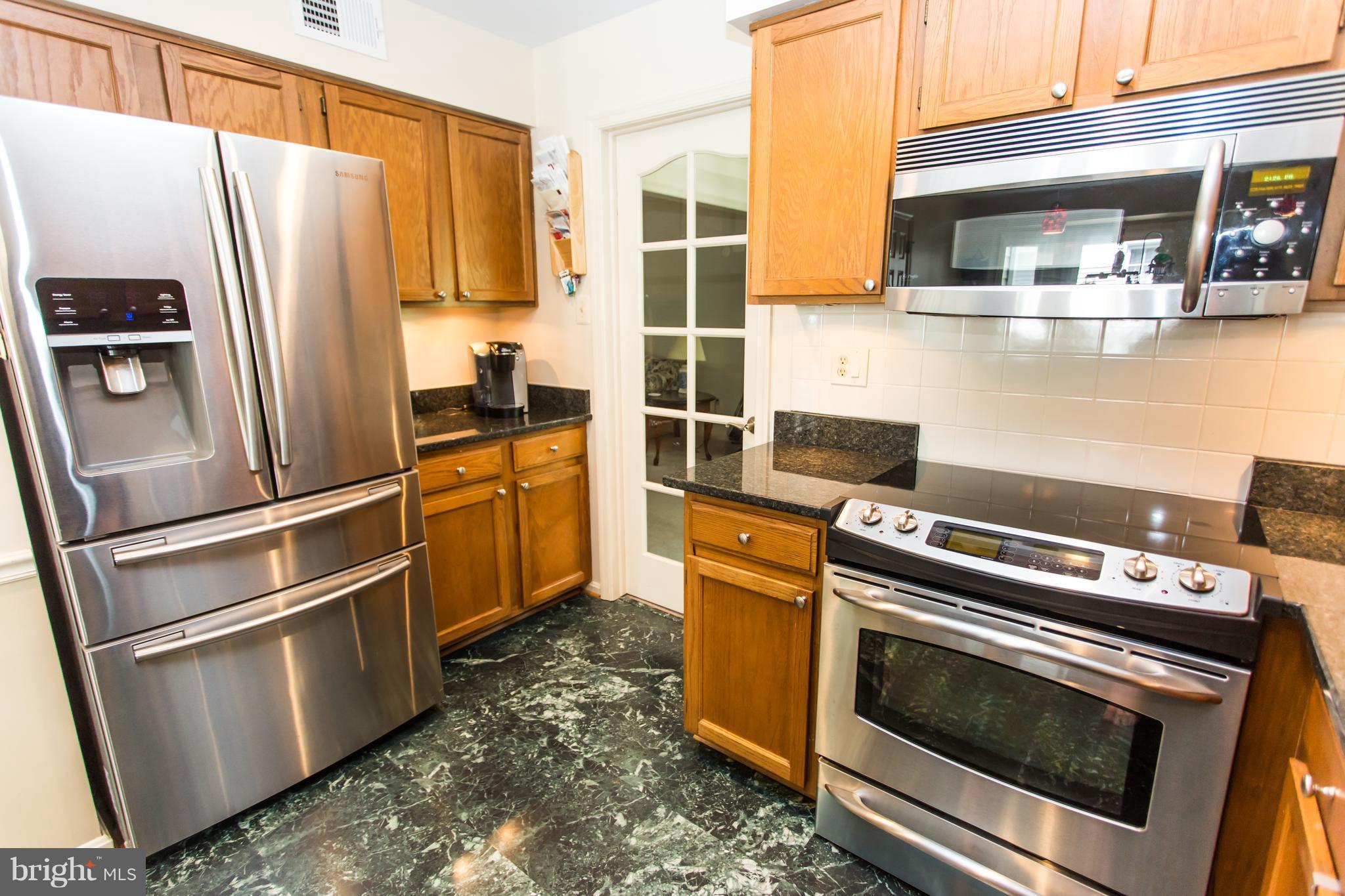 6604 Morning Ride Circle Alexandria, VA 22315 - Photo 4 of 30 Kitchen with stainless steel appliances