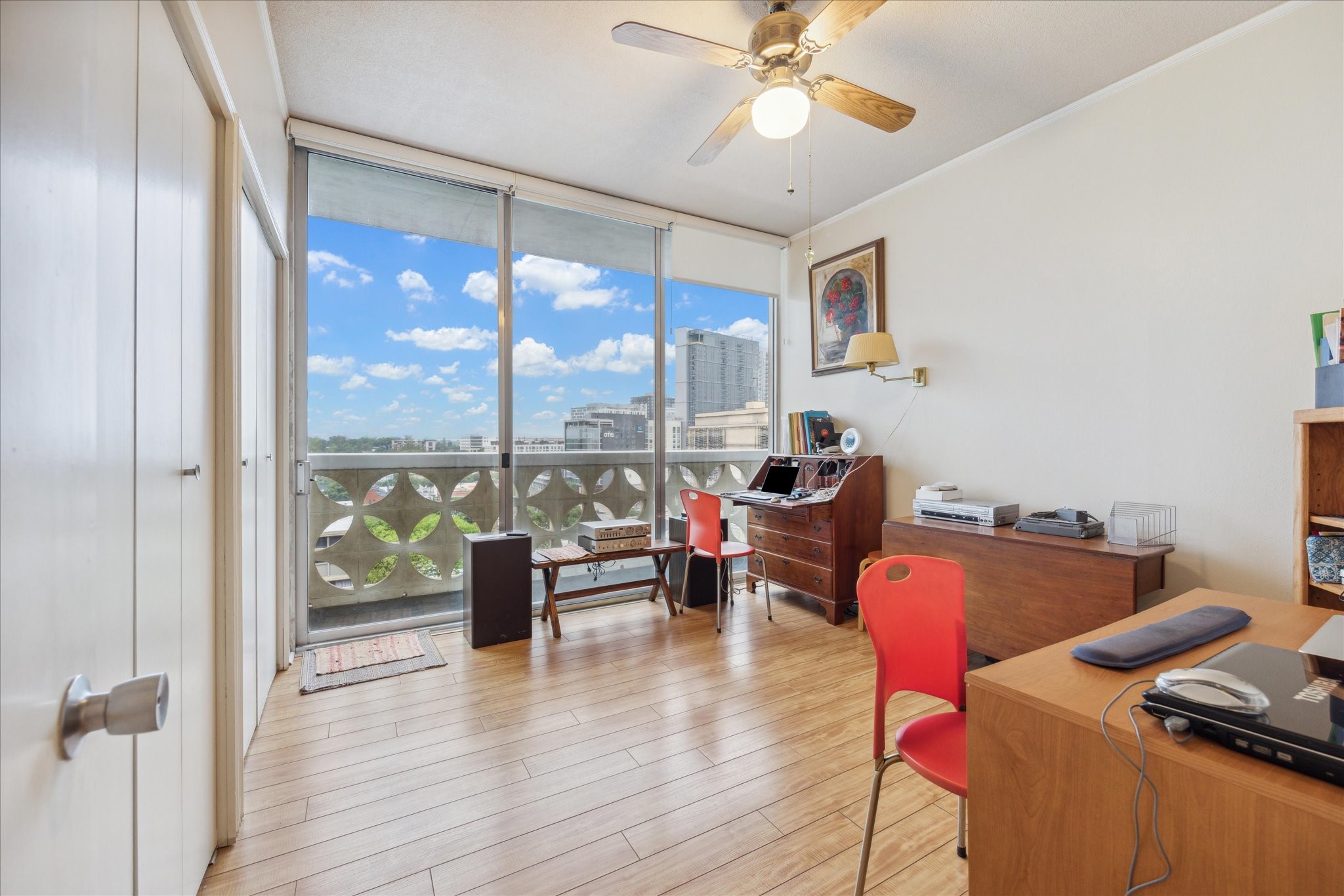 1801 Lavaca Street, Unit 7L Austin, TX 78701 - Photo 7 of 25 a living room with furniture and a floor to ceiling window