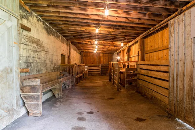 a view of a room with a large door