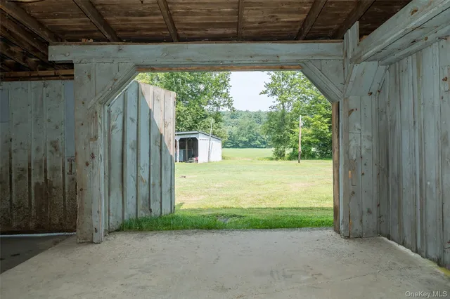 a view of a field with an ocean