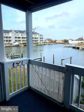 a view of a lake from a balcony