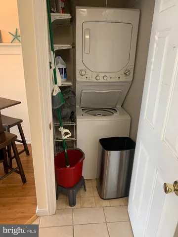 a room with wooden floor and furniture