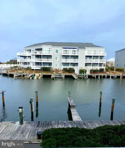 a view of a lake with building in front of it