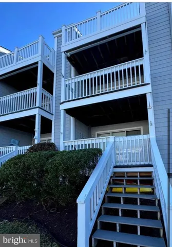 a view of balcony with furniture