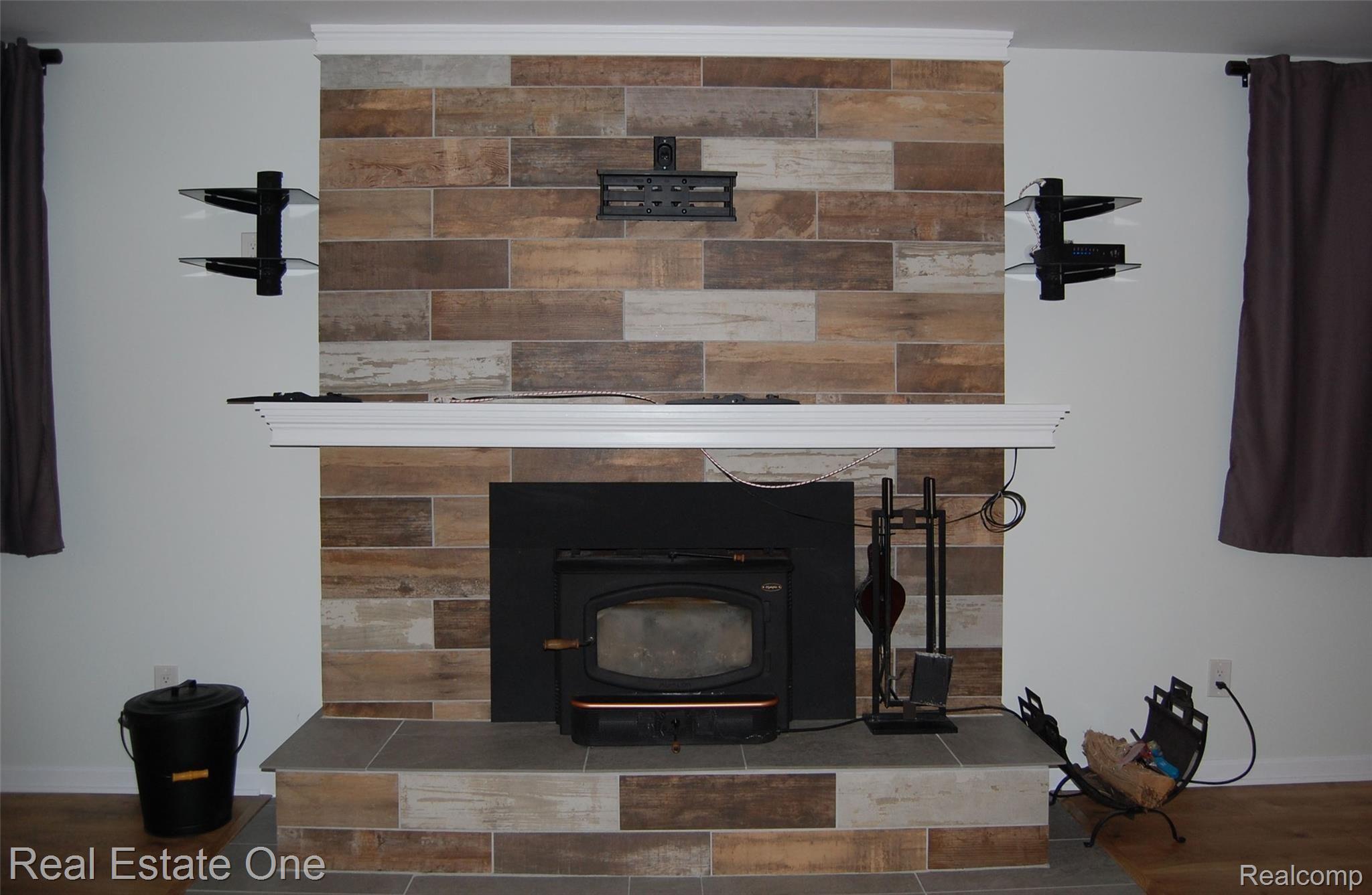 12975 15 Mile Road Sterling Heights, MI 48312 - Photo 8 of 26 Fireplace.jpg