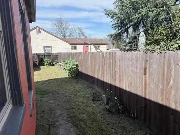 a view of a wooden fence