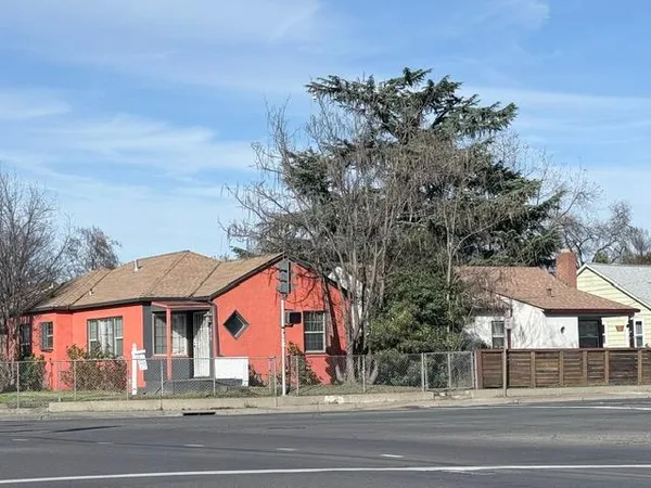 a view of street with houses