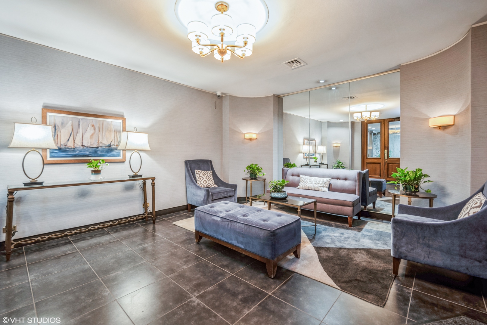 720 West Gordon Terrace, Unit 11F Chicago, IL 60613 - Photo 2 of 12 a living room with furniture and wooden floor