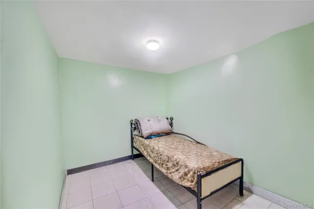 a hallway with a bench and couch