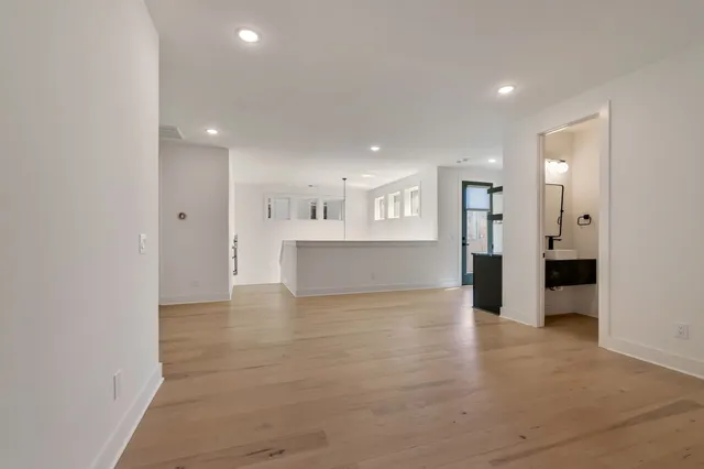a view of large windows in a kitchen