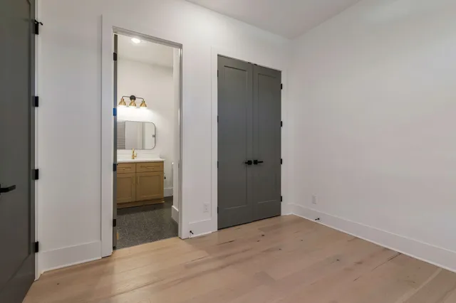 a view of a bathroom from a hallway