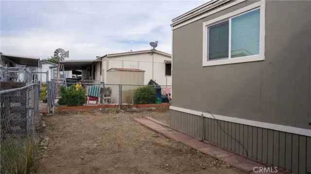 a view of a street with a garage