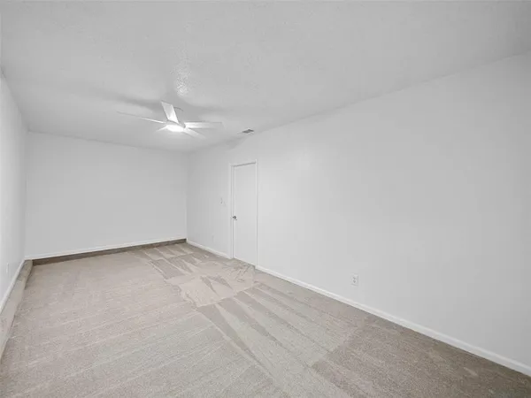 a view of a room with an empty space