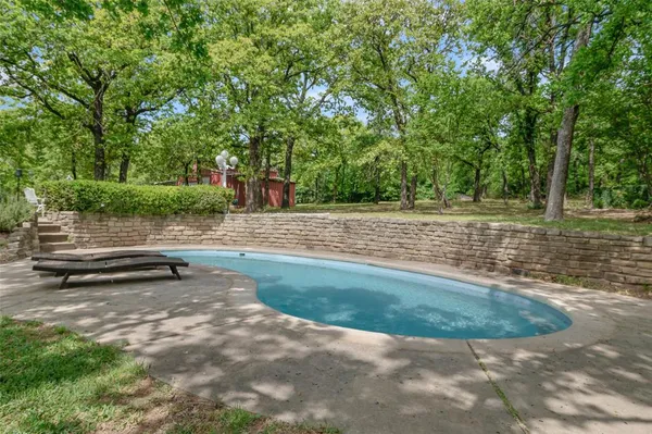 a view of a bench in a yard