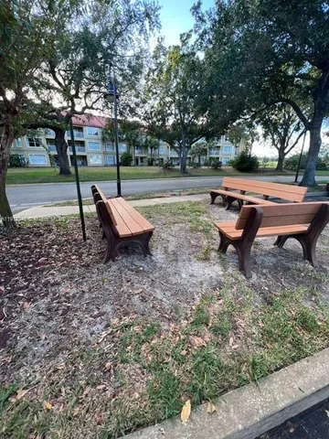 a backyard of a house with outdoor seating