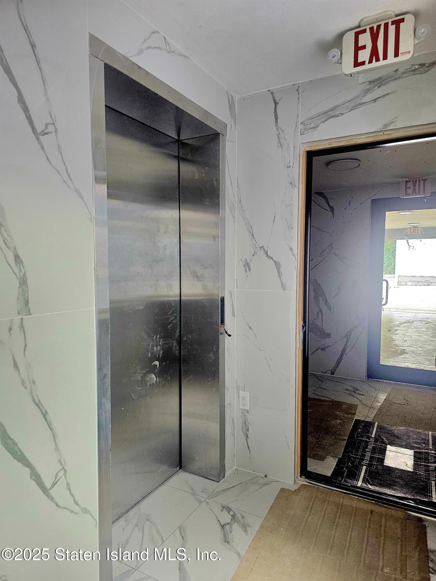 3865 Amboy Road, Unit 4B Staten Island, NY 10308 - Photo 17 of 20 a bathroom with a shower and a sink