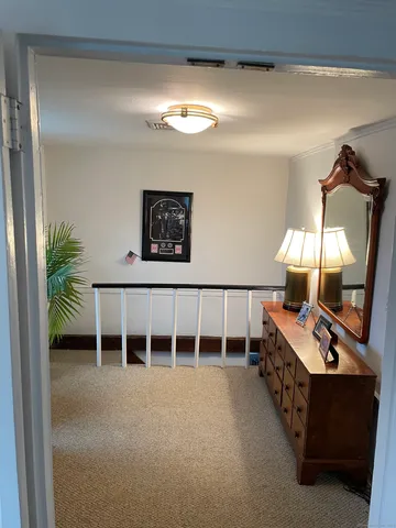 a room with furniture and a mirror