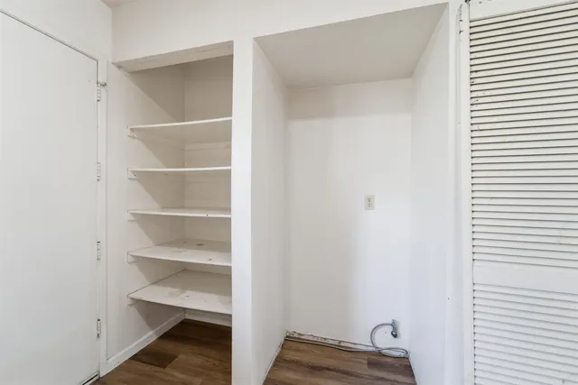 a view of a room with rack on the wall