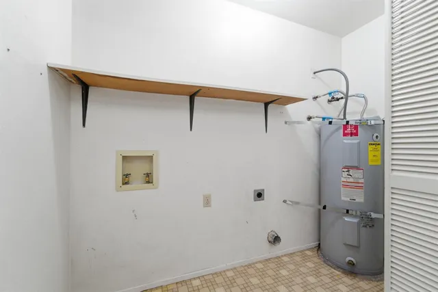 a bathroom with a shower and a toilet