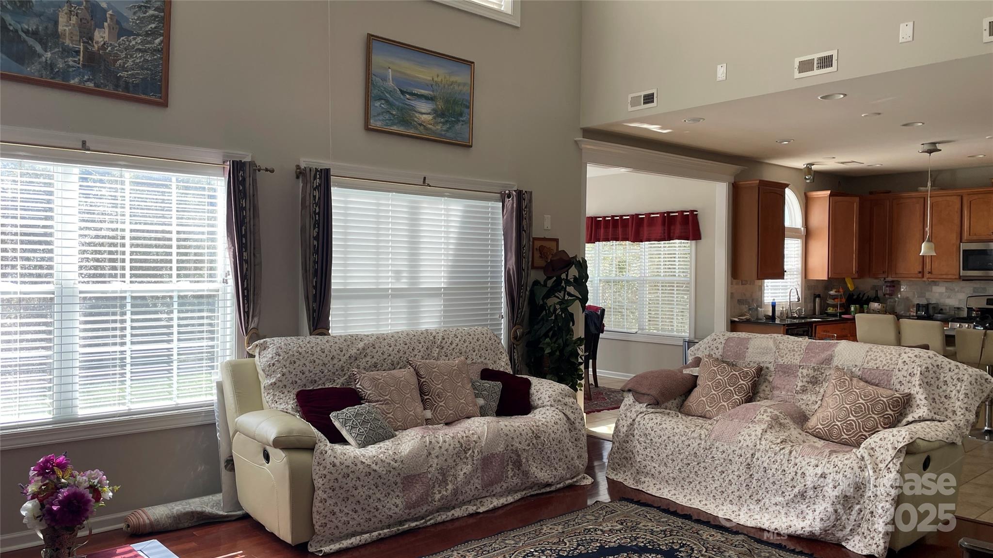 14701 Provence Lane Charlotte, NC 28277 - Photo 6 of 10 a living room with furniture and a large window