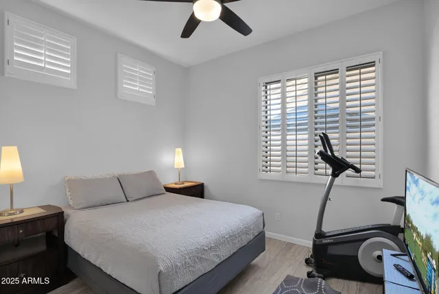 a bedroom with furniture and a window