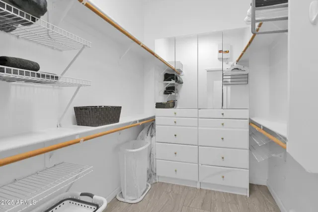 a view of a balcony with couches and city view