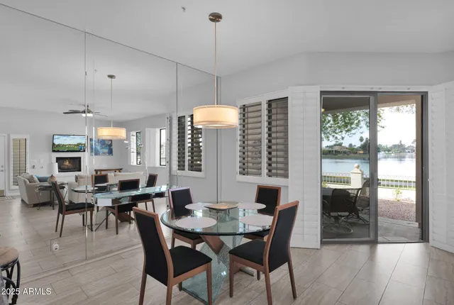 a view of a dining room with furniture window and outside view