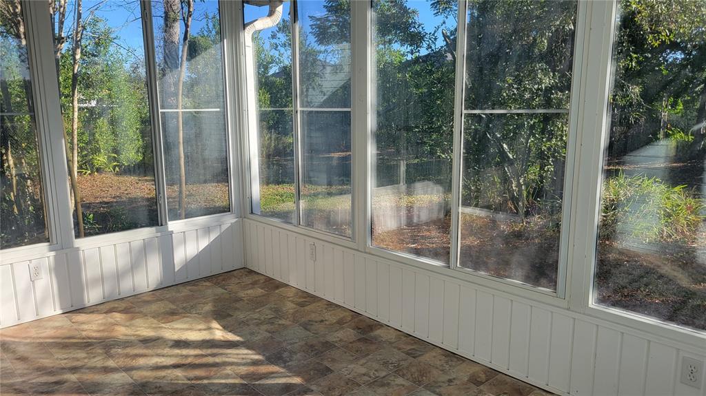 10881 Southwest 75th Avenue Ocala, FL 34476 - Photo 11 of 11 a view of a glass door and the balcony