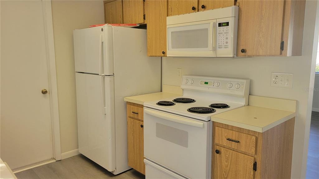 10881 Southwest 75th Avenue Ocala, FL 34476 - Photo 4 of 11 a utility room with dryer and washer