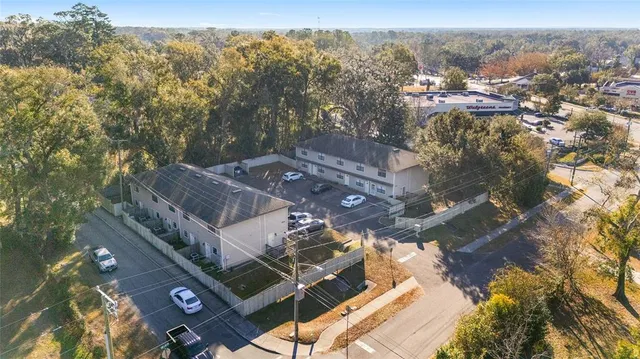 an aerial view of a house with a garden