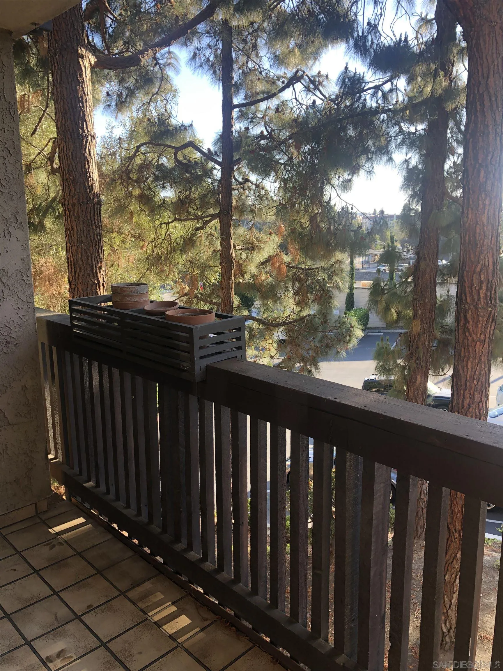 6202 Friars Road, Unit 224 San Diego, CA 92108 - Photo 1 of 13 a view of a wooden fence
