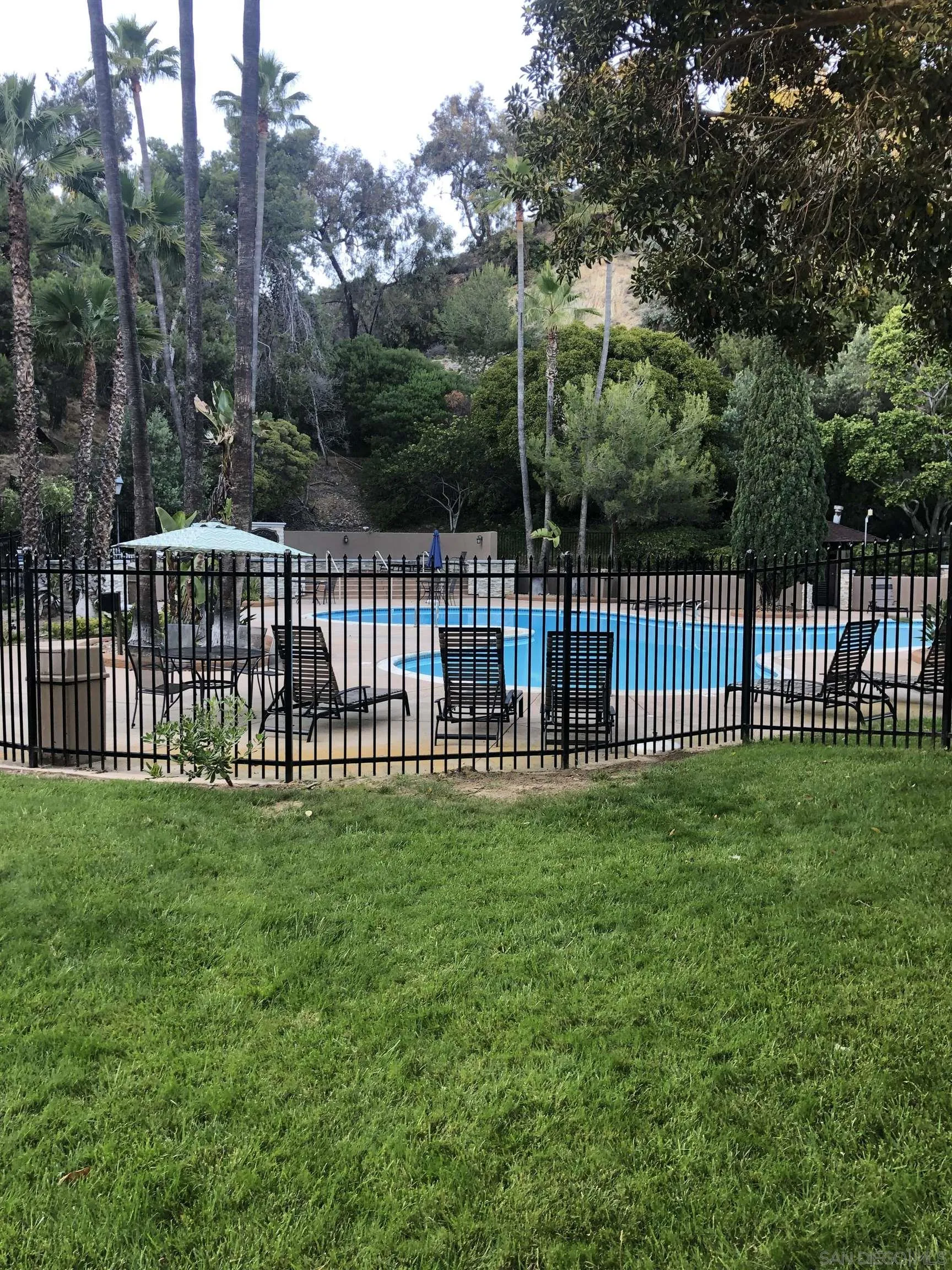 6202 Friars Road, Unit 224 San Diego, CA 92108 - Photo 3 of 13 a view of a deck with a yard