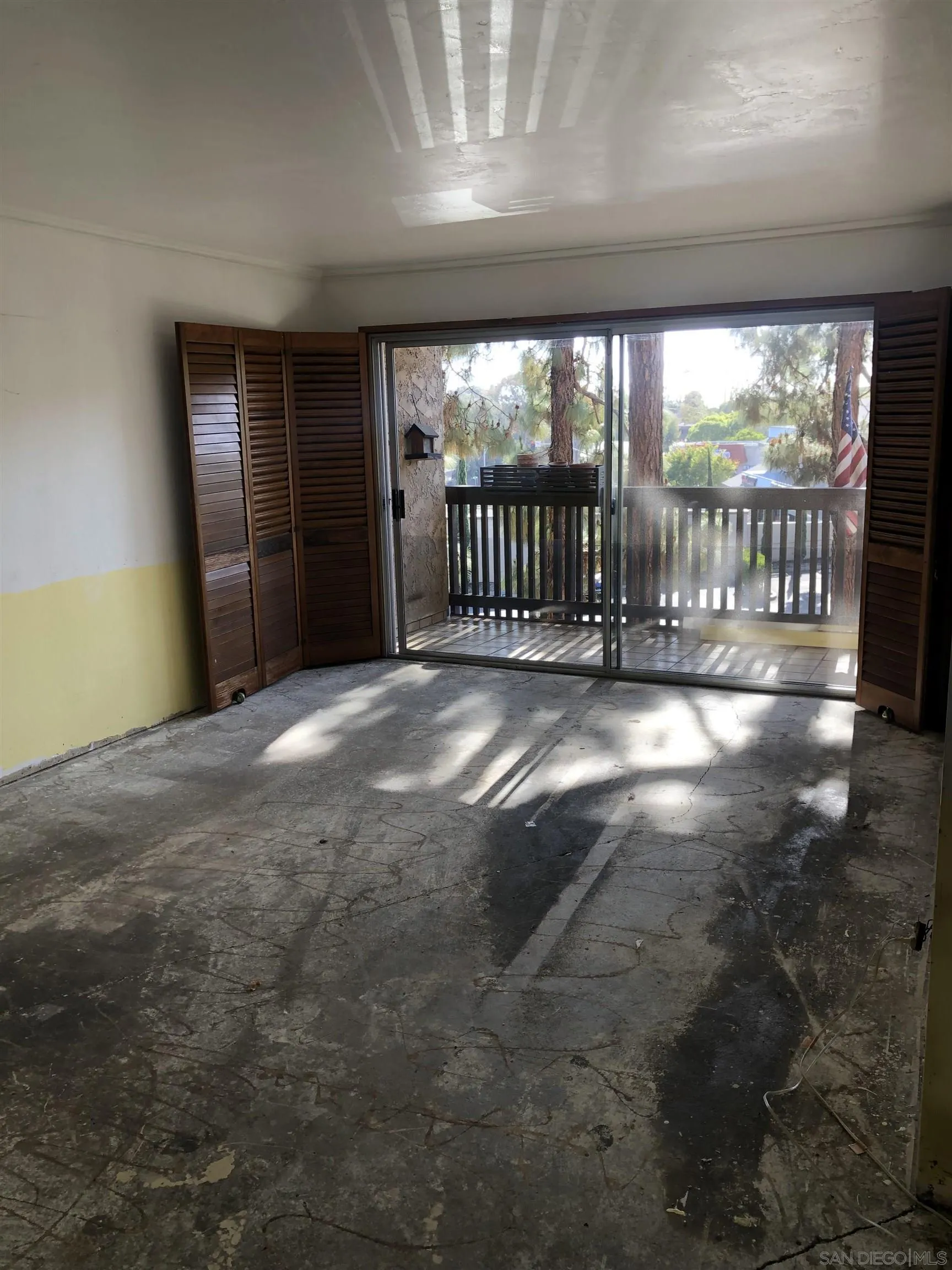6202 Friars Road, Unit 224 San Diego, CA 92108 - Photo 5 of 13 a view of an empty room with a large window