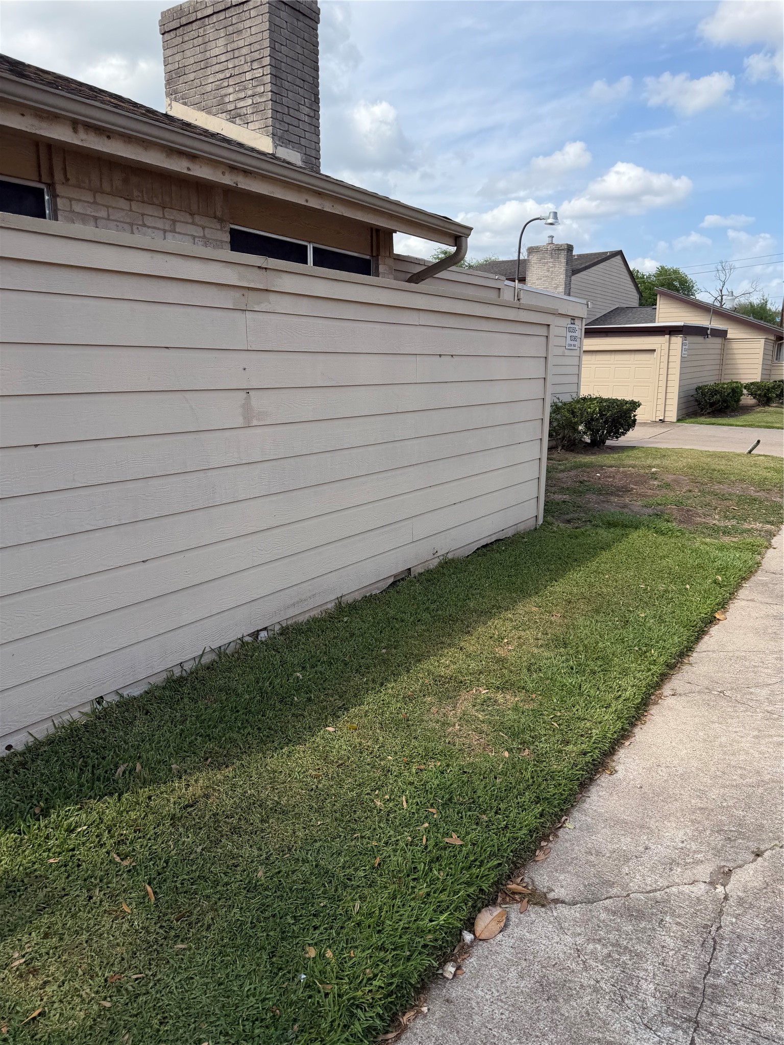10362 Cook Road Houston, TX 77099 - Photo 12 of 16 a view of a back yard of the house