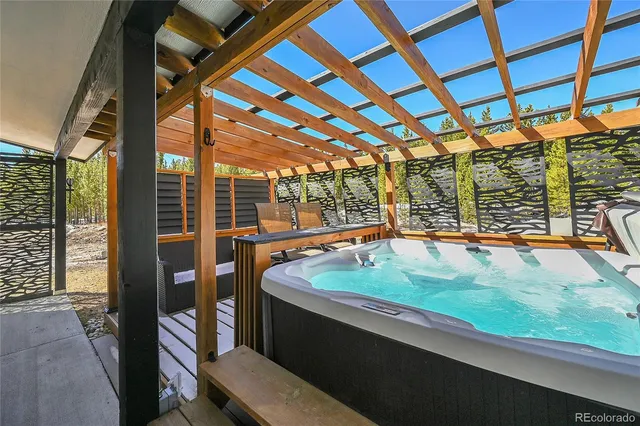 a room with water heater and a large window