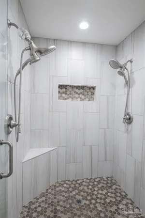 a view of room with window and ceiling fan