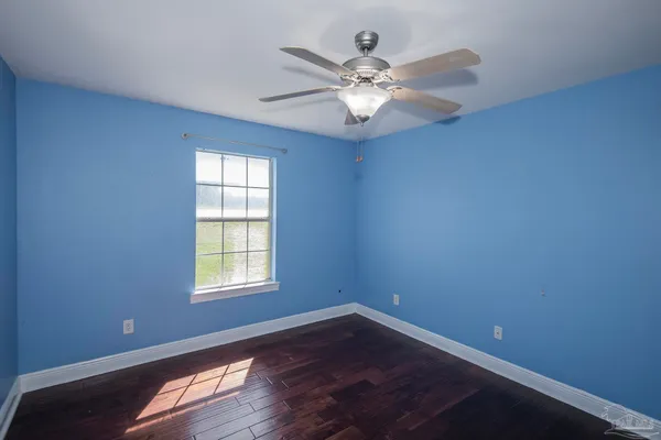 a view of a field with an outdoor space