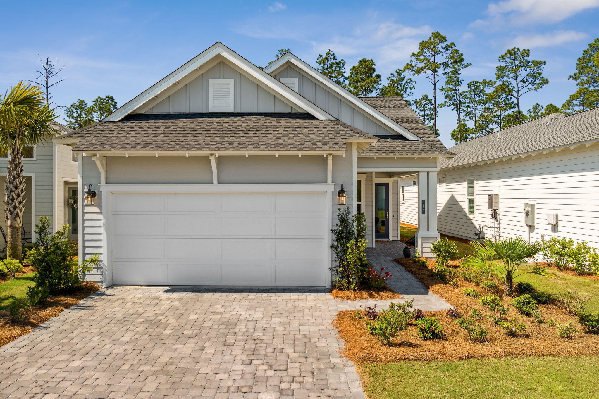 92 East Lafayette Rd Inlet Beach Inlet Beach, FL 32461 - Photo 3 of 51 a front view of a house with a yard and potted plants