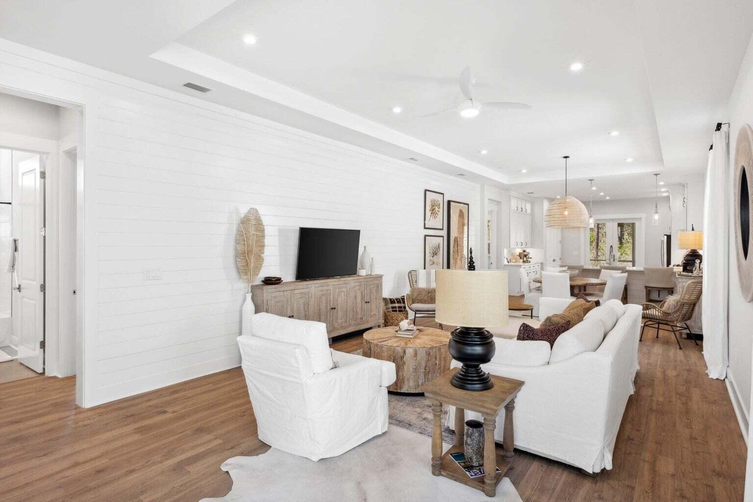 92 East Lafayette Rd Inlet Beach Inlet Beach, FL 32461 - Photo 7 of 51 a living room with fireplace furniture and a wooden floor