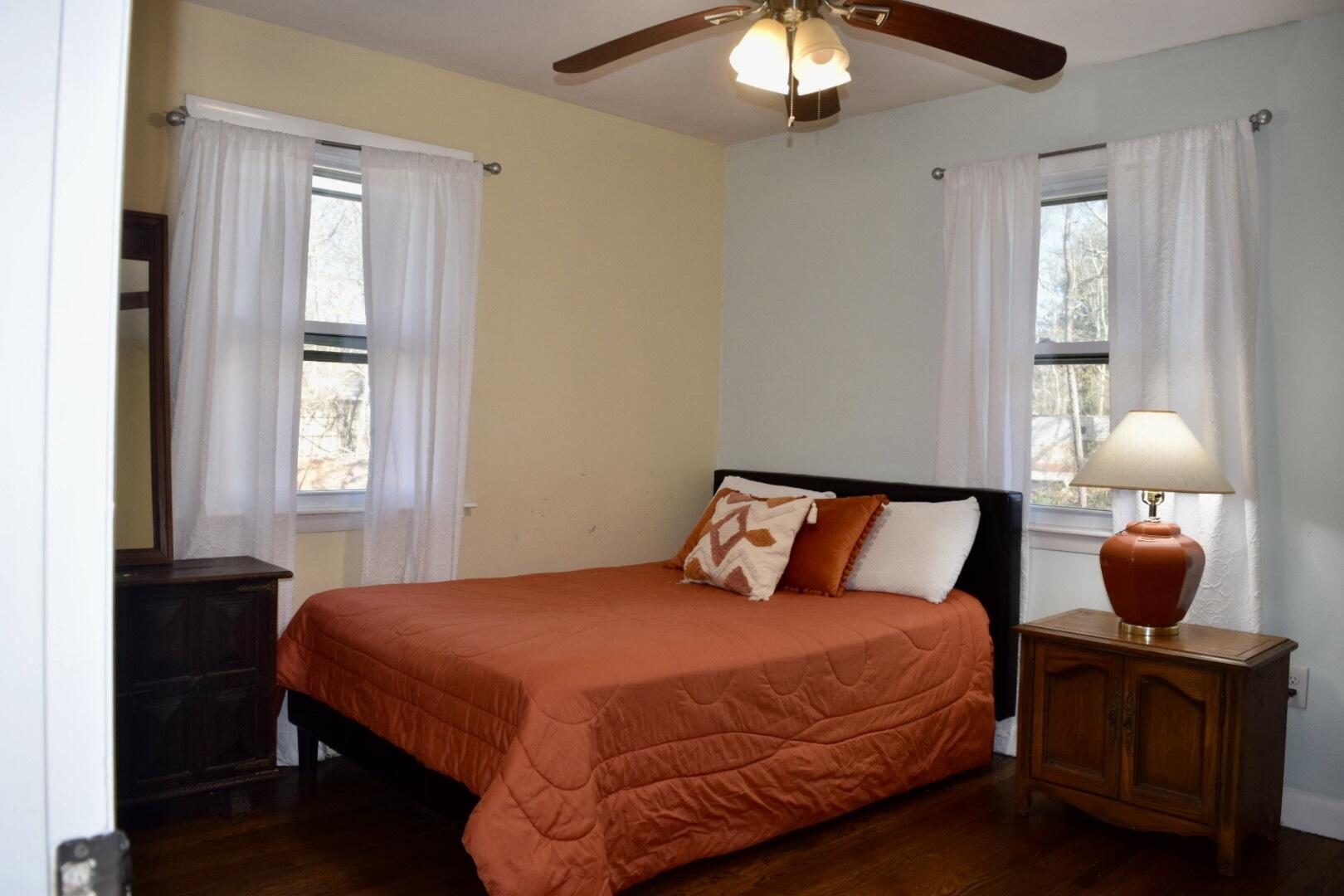 140 Mitchells Way Hyannis, MA 02601 - Photo 14 of 45 a bedroom with a bed and window