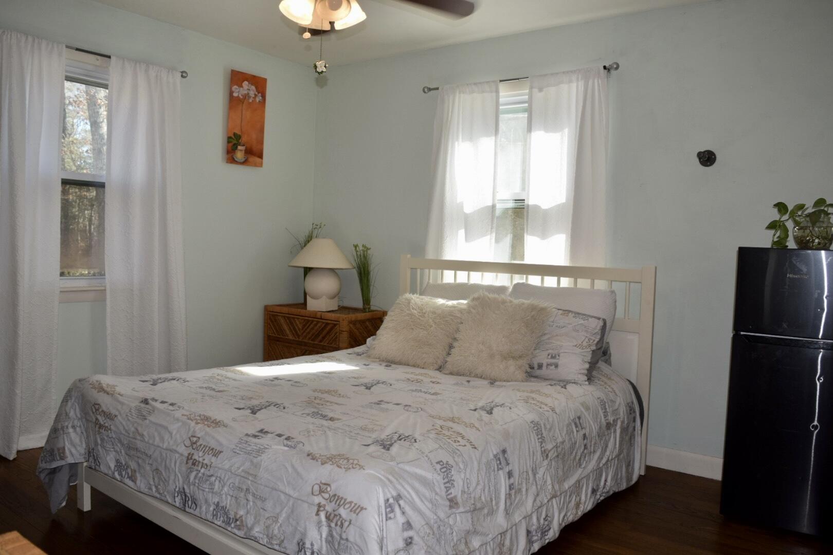 140 Mitchells Way Hyannis, MA 02601 - Photo 19 of 45 a bedroom with a bed and a window